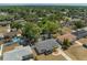 Aerial view of the property showcasing its location within a neighborhood with mature trees at 4550 53Rd N Ave, St Petersburg, FL 33714