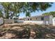 Spacious backyard with a storage shed and a white fence at 4550 53Rd N Ave, St Petersburg, FL 33714