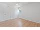 Bright bedroom with light wood floors, two doors and natural light at 4550 53Rd N Ave, St Petersburg, FL 33714