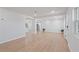 Spacious living room with wood floors, neutral paint, and natural light offers an open concept at 4550 53Rd N Ave, St Petersburg, FL 33714