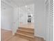 Open-concept living room featuring wood floors and access to a kitchen at 4550 53Rd N Ave, St Petersburg, FL 33714