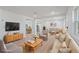 Bright living room with recessed lights, wood floors, and neutral decor offers a comfortable space at 4550 53Rd N Ave, St Petersburg, FL 33714