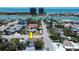 A high angle view of the property showing the street and surroundings including the bay in the distance at 512 79Th Ave, St Pete Beach, FL 33706