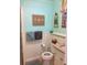Updated bathroom with decorative towels, starfish, and a wooden lighthouse at 512 79Th Ave, St Pete Beach, FL 33706