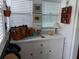 Coastal-style room with a white dresser, blinds, and beach-themed decor at 512 79Th Ave, St Pete Beach, FL 33706