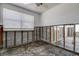 Bare bedroom features block construction, exposed wall beams and large window at 512 79Th Ave, St Pete Beach, FL 33706