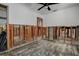 Interior space with bare walls and framing ready for renovation and new flooring at 512 79Th Ave, St Pete Beach, FL 33706