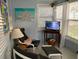 Cozy sunroom area with seating, tv, and bright decor perfect for relaxing and enjoying natural light at 512 79Th Ave, St Pete Beach, FL 33706