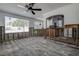 Bright room with large windows and view into the kitchen area at 512 79Th Ave, St Pete Beach, FL 33706