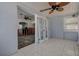 Sunroom with a tile floor opens up to a living room at 512 79Th Ave, St Pete Beach, FL 33706