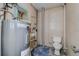 Utility room showing the hot water heater and toilet at 512 79Th Ave, St Pete Beach, FL 33706