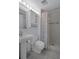 Bathroom showing a toilet, sink, mirror, medicine cabinet, and a shower with curtain at 5814 Silver Moon Ave, Tampa, FL 33625