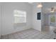 Open concept dining area adjacent to the living room with ample natural light at 5814 Silver Moon Ave, Tampa, FL 33625