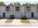 Charming townhouse featuring balconies, garage doors, and a well-maintained exterior at 6462 92Nd N Pl # 804, Pinellas Park, FL 33782
