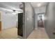 Hallway leading to living area and staircase at 6462 92Nd N Pl # 804, Pinellas Park, FL 33782