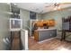 Cozy kitchen with wood cabinets, stainless steel appliances, and modern lighting at 6462 92Nd N Pl # 804, Pinellas Park, FL 33782