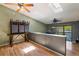 Bright living room featuring hardwood floors, skylights, and modern ceiling fans at 6462 92Nd N Pl # 804, Pinellas Park, FL 33782