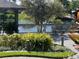 Beautiful backyard deck view of gazebo and lake at 8742 Bermuda Ln, Port Richey, FL 34668