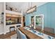 Bright dining room with open access to a kitchen featuring stainless steel appliances and granite countertops at 8742 Bermuda Ln, Port Richey, FL 34668