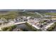 Beautiful aerial view of waterfront townhomes situated along canals and roadways at 9001 Tudor Dr # H210, Tampa, FL 33615