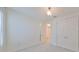 Bedroom featuring neutral carpet, white walls, and closet entry at 933 Signet Dr, Apollo Beach, FL 33572