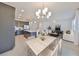 Open floor plan showcasing a modern kitchen, dining area, and comfortable living space at 933 Signet Dr, Apollo Beach, FL 33572