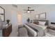 Cozy bedroom with neutral tones, decorative accents, and a relaxing atmosphere at 933 Signet Dr, Apollo Beach, FL 33572