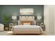 Serene bedroom featuring a plush bed, stylish lamps, and calming decor for a restful retreat at 9344 Cannon Beach Dr, Parrish, FL 34219