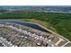 A beautiful community featuring single-Gathering homes, a serene lake, and a scenic greenbelt at 9433 Channing Hill Dr, Sun City Center, FL 33573