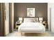 Cozy bedroom with a large window, ample natural light, stylish decor, and a neutral color scheme for relaxation at 9816 Minnow Ray Dr, Land O Lakes, FL 34638