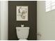 Modern powder room with stylish decor and a sleek toilet at 9816 Minnow Ray Dr, Land O Lakes, FL 34638
