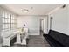 Bright dining room with large windows and a comfortable dining set at 1000 W Horatio St # 207, Tampa, FL 33606