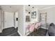 Open living area with modern kitchen, breakfast bar, and seating at 1000 W Horatio St # 207, Tampa, FL 33606