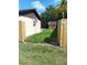 A backyard with a shed and new wooden fence at 12619 98Th St, Largo, FL 33773