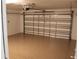 Large garage with epoxy flooring and insulated garage door at 12619 98Th St, Largo, FL 33773