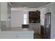 Bright, updated kitchen with modern appliances and a view into the living area at 12619 98Th St, Largo, FL 33773
