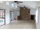 Spacious living area featuring high ceilings, stone accents, and tile flooring at 12619 98Th St, Largo, FL 33773