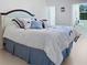 Comfortable bedroom with stylish bedding and ample natural light at 1325 58Th N St # 204A, St Petersburg, FL 33710