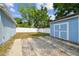 Spacious backyard with a shed and white fence, providing ample room for recreation and outdoor storage at 1724 W Saint Conrad St, Tampa, FL 33607