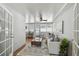 Cozy sunroom with tile floors, comfortable seating, and plenty of natural light at 1724 W Saint Conrad St, Tampa, FL 33607