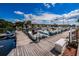 A harbor full of boats on a sunny day with a blue sky and puffy clouds at 1805 Mariner Dr # 52, Tarpon Springs, FL 34689