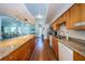 Kitchen area offering spacious counters, stainless appliances and hardwood floors at 1805 Mariner Dr # 52, Tarpon Springs, FL 34689