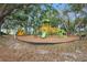Colorful community playground with slides and climbing structures at 18111 Paradise Point Dr, Tampa, FL 33647