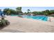 Large outdoor pool with lounge chairs and a clear blue swimming area at 18111 Paradise Point Dr, Tampa, FL 33647