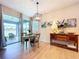Cozy dining area with views of the lake, a table for four, and stylish decor at 20983 Monza Loop, Land O Lakes, FL 34638