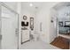 Bright bathroom featuring black and white tile floor and separate glass shower at 21840 Waverly Shores Ln, Land O Lakes, FL 34637