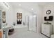 Bright bathroom featuring black and white tile floor, tub, and separate glass shower at 21840 Waverly Shores Ln, Land O Lakes, FL 34637