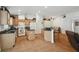 Bright and open kitchen with granite countertops, central island, and convenient bar seating at 21840 Waverly Shores Ln, Land O Lakes, FL 34637