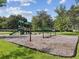 Neighborhood playground featuring play equipment, slides, and swings, designed for outdoor fun and activity at 21840 Waverly Shores Ln, Land O Lakes, FL 34637