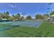Outdoor tennis courts provide a great space for recreation on a sunny day at 21840 Waverly Shores Ln, Land O Lakes, FL 34637